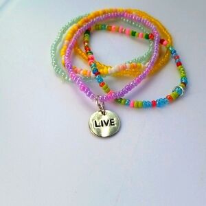 Live Charm Set of Pastel and Confetti Stretch Bracelets Jewelry. 7/09/107